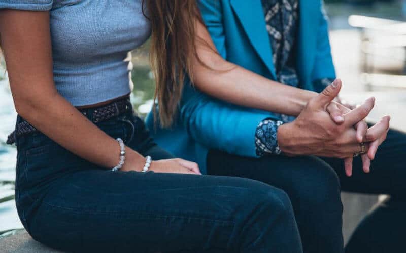 Couple holding hands
