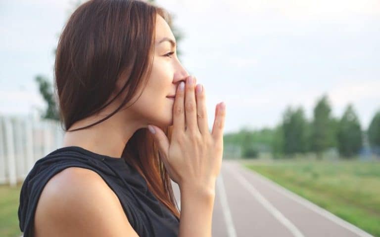 Woman practicing gratitude