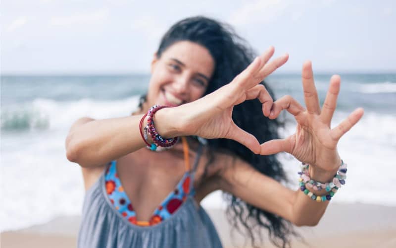 Smiling woman on the beach