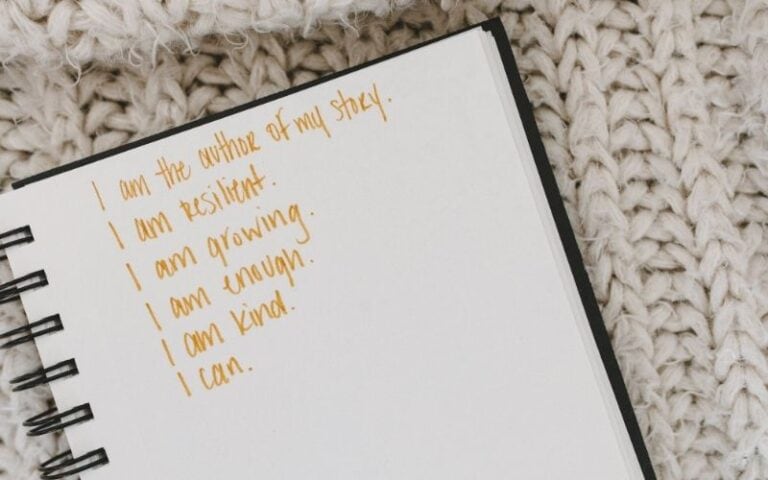affirmations written in a notebook