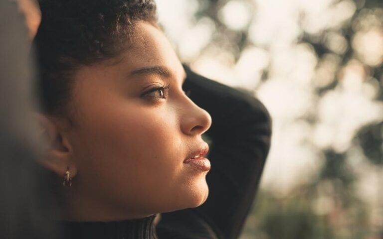 young woman of color outside