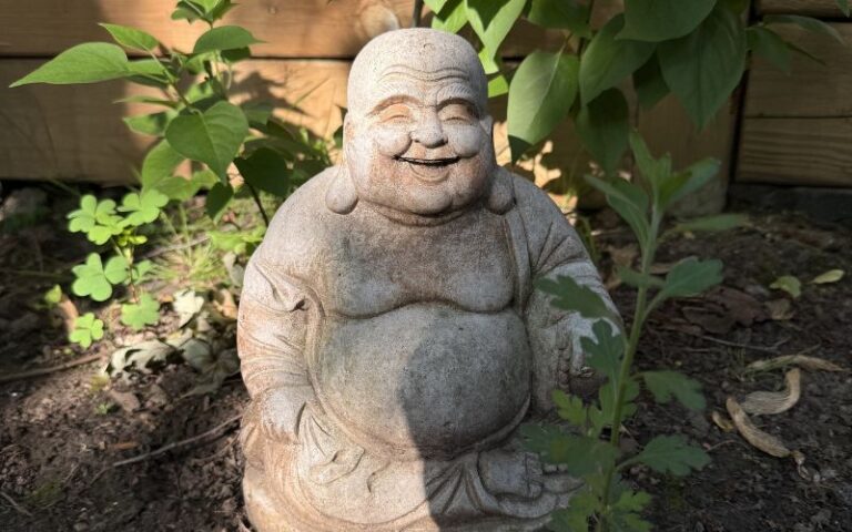 Happy Buddha in the garden
